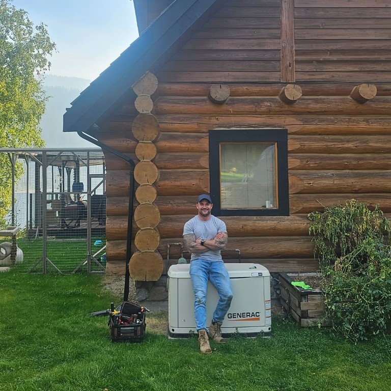 Generac standby generator installed beside a log home at Adams Lake, BC